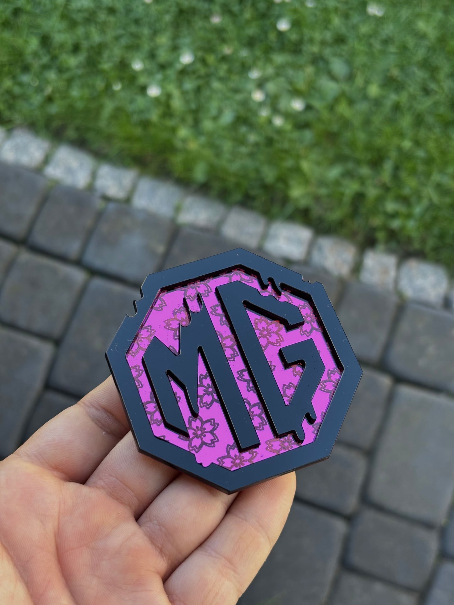MG
