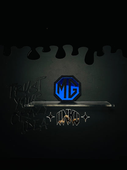 MG