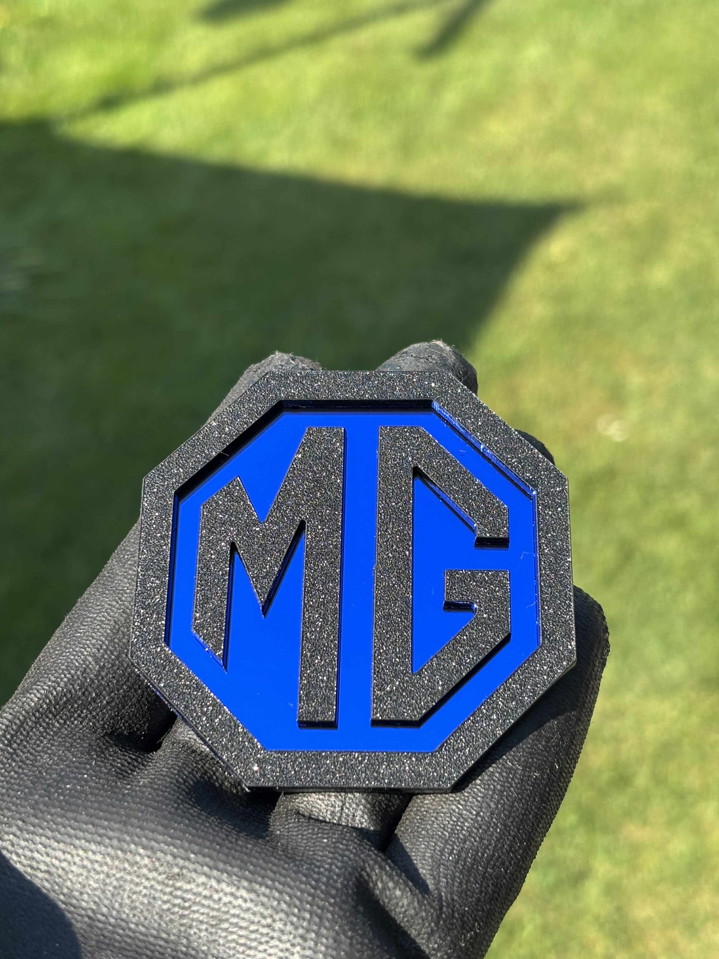 MG